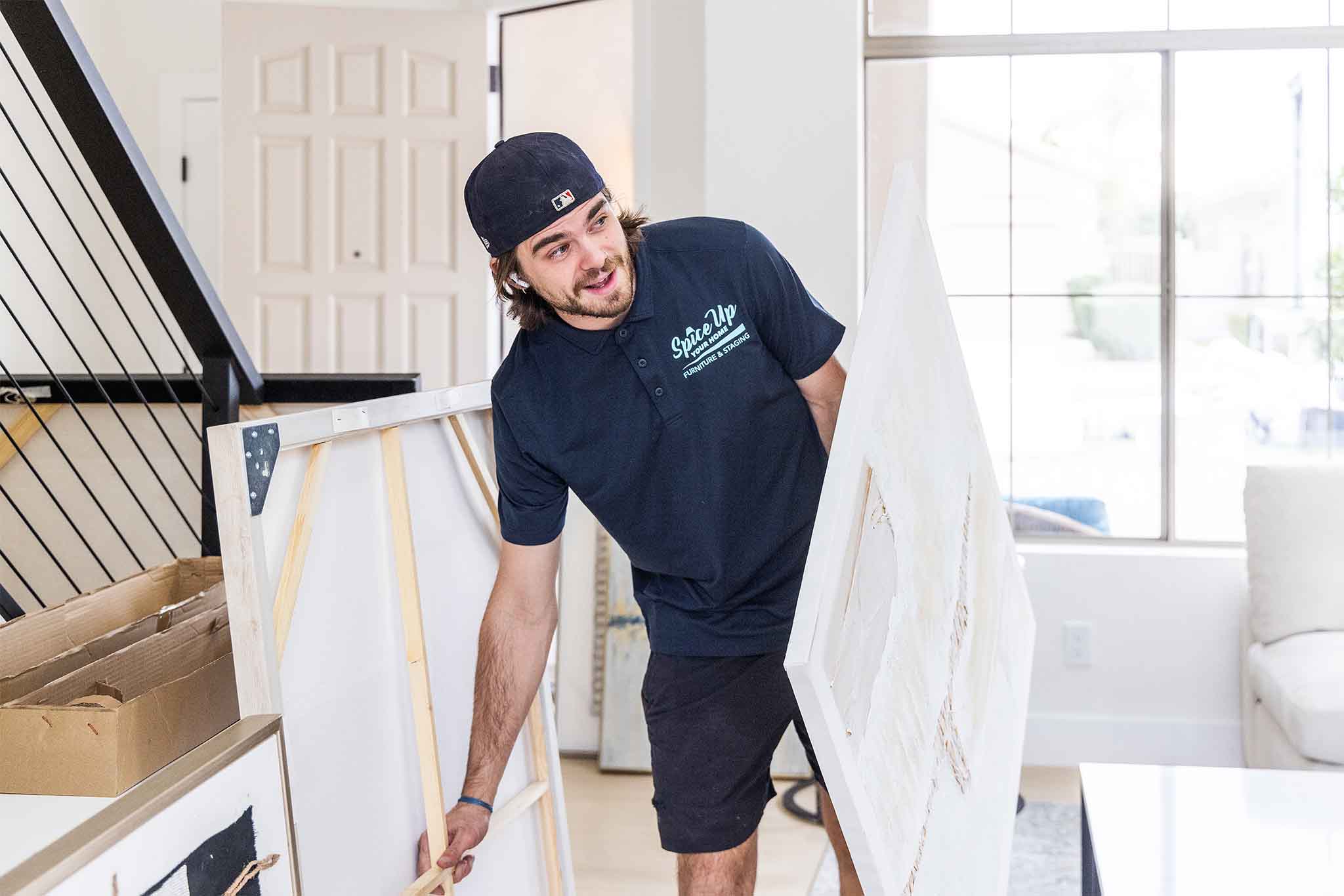 SUYH-Staging-and-Furniture-Team-paintings SUYH Staging Services Team member cleaning